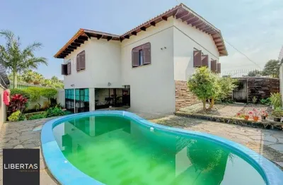 Casa com 3 quartos à venda na Avenida Clemenciano Barnasque, 219, Teresópolis, Porto Alegre