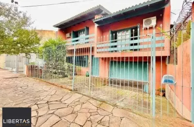 Casa com 3 quartos à venda na Rua Capibaribe, 128, São Sebastião, Porto Alegre