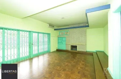 Casa com 5 quartos à venda na Rua Coronel Paulino Teixeira, 394, Rio Branco, Porto Alegre