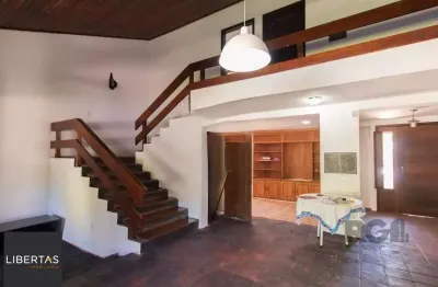 Casa com 3 quartos à venda na Avenida Monte Cristo, 46, Vila Nova, Porto Alegre