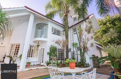 Casa com 3 dormitórios, 2 vagas de garagem no bairro Marechal Rondon em Canoas.