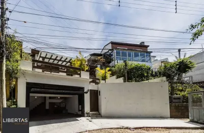 Casa com 3 quartos à venda na Rua Teixeira de Carvalho, 215, Medianeira, Porto Alegre