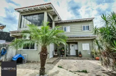 Casa com 3 quartos à venda na Rua Coronel João Pacheco de Freitas, 404, Jardim Itu Sabará, Porto Alegre