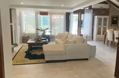 Casa 4 suites no Terra Ville, com gabinete, 4 vagas e piscina.