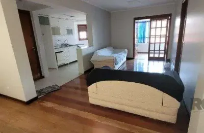 Apartamento de 2 dormitórios grande com suite, sacada fechada com churrasqueira, elevador, garagem, no Bairro São João / Higienópolis