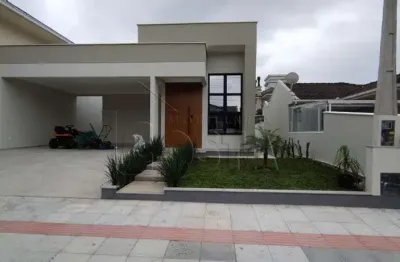 Casa em condomínio fechado com 3 quartos à venda na rua monte cambirela, 456, praia de fora, palhoça por r$ 990.000