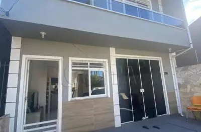 Casa com 4 quartos à venda na rua dos bacuparis, 250, madri, palhoça por r$ 583.000