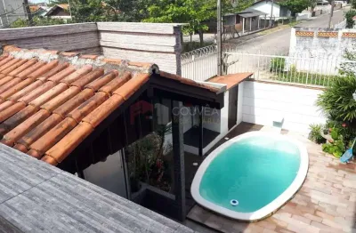 Casa para venda em navegantes, meia praia, 4 dormitórios, 1 suíte, 3 banheiros, 2 vagas