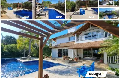 Casa com 4 dormitórios em condomínio, 388 m² - aluguel por r$ 22.900/mês  cacupé - florianópolis/sc