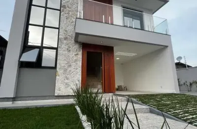 Casa com 3 quartos à venda na rua tia silvia, 54, pinheira, palhoça por r$ 1.890.000