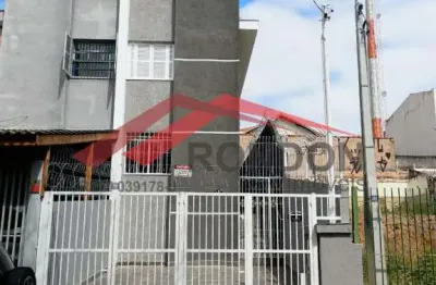 Sobrado para fins comerciais com 4 dormitórios, 2 banheiros, 2 vagas