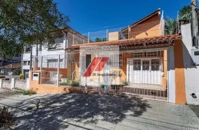 Casa com 5 quartos para alugar na Rua Umbú, 379, Passo da Areia, Porto Alegre