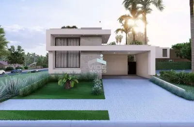 Casa em condomínio de luxo com 3 suítes e 4 vagas no parque brasil 500, paulínia-sp.