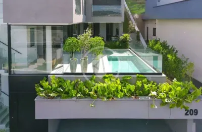 Linda casa em condomínio fechado, 448m2, 4 suítes, 3 vagas, alphaville. codigo: 142856