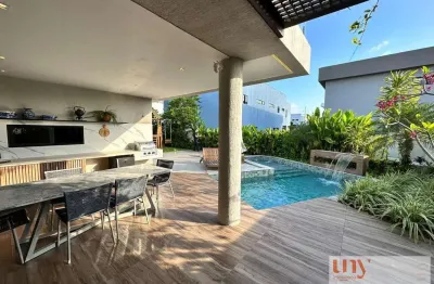 Casa luxuosa com 4 suítes e área de lazer privativa em condomínio fechado no bairro de intermares