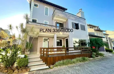 Casa na avenida ecoville em condomínio com infra com 04 dormitórios sendo duas suítes.