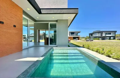 Casas e sobrados em condomínio fechado à venda no bairro capão novo - 2 vagas de garagem