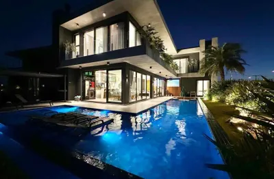 Casas e sobrados em condomínio fechado à venda no bairro capão novo - 2 vagas de garagem