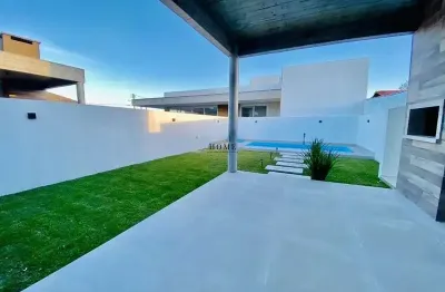 Casa com 4 quartos à venda na central, araça, capão da canoa, 199 m2 por r$ 1.450.000
