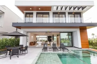 Casa em condomínio fechado com 5 quartos à venda na Rua Rio Jacuí, Centro, Xangri-Lá