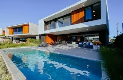 Casa em condomínio fechado com 6 quartos à venda na rua rio jacuí, centro, xangri-lá, 438 m2 por r$ 7.500.000