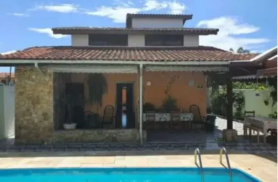 Casa com 3 quartos, piscina, área gourmet e jardim em itanhaém.