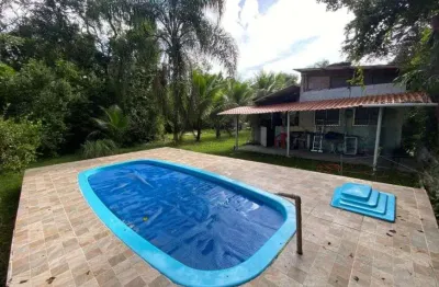 Chácara com piscina e área gourmet com churrasqueira em itanhaém.