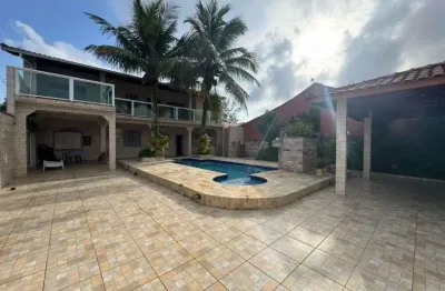 Casa com piscina, 3 quartos e churrasqueira em itanhaém.