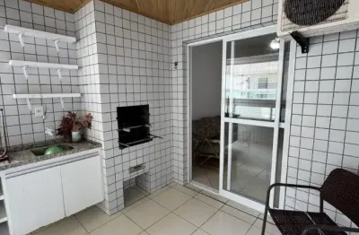 Apartamento à 150m do mar com piscina e área gourmet em praia grande.