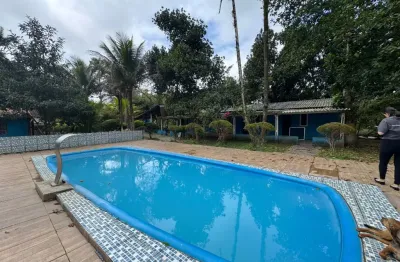 Chácara com 5 quartos, piscina e área gourmet com churrasqueira em peruíbe.