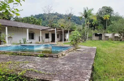 Chácara com 4 quartos e piscina em peruíbe - r$ 220.000,00.