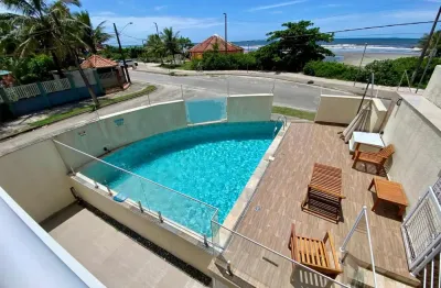 Apartamento frente mar com piscina e área gourmet em itanhaém.