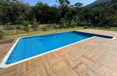 Chácara com 4 quartos, piscina e churrasqueira em peruíbe - r$ 1.200.000,00.