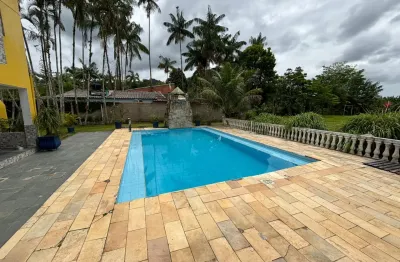 Chácara com piscina, 10 quartos, área gourmet e árvores frutíferas em peruíbe.