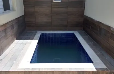 Casa em condomínio com 2 quartos e churrasqueira em Itanhaém.