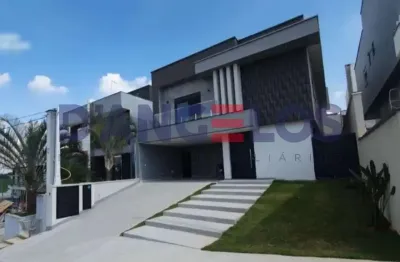 Sobrado de luxo em condomínio no residencial real park em arujá-sp: 4 suítes, 2 salas, 5 banheiros, 282m².