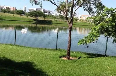 Lote no condomínio alphaville - jardim itália - próximo do parque tia nair e jardim das américas