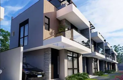 Sobrado com 134,65 m de area total, sendo 24,07 m de terraco descoberto exclusivo.