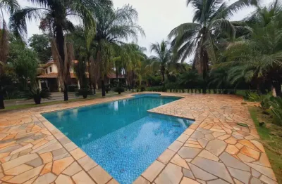 Chácara residencial à venda com 545,23m² de área construída, casa principal com 04 quartos e áreas de convivência no Condomínio Itanhangá Chácaras de Recreio, em Ribeirão Preto/SP.