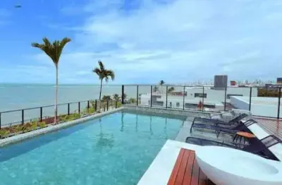 Apartamento de 42m2 frente mar e pé na areia, mobiliado e projetado