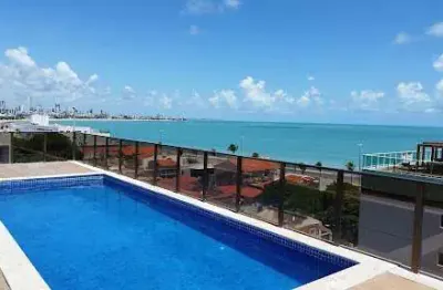 Apartamento de 58m2 com 2 quartos, móveis projetados, à 50m do mar