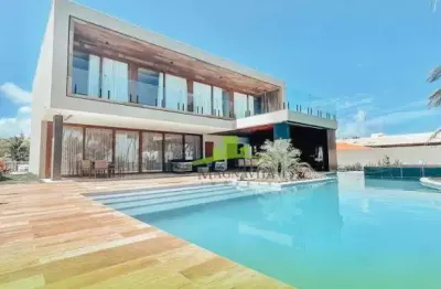 Casa frente mar em guarajuba, 6 suítes, piscina, área gourmet, alto luxo e porteira fechada. imóvel exclusivo em condomínio. agende sua visita!