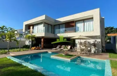 Casa à venda no condomínio paraíso, guarajuba, 303m², 7 suítes, piscina, área gourmet, a 20m da praia, porteira fechada. agende sua visita!