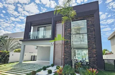 Casa a venda alphaville litoral norte 1 | possui 275,06m² | 4 suítes | piscina | área gourmet | 4 vagas | litoral norte | iluminação em led
