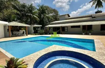 Casa à venda em condomínio lauro de freitas: 430m², 6 quartos, 4 suítes, piscina, área gourmet, área verde, segurança 24h, próxima à estrada do coco