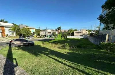 Terreno à venda alphaville salvador 2, 490m², lote de esquina com leve declive. excelente localização. oportunidade em condomínio de alto padrão