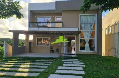 Alphaville litoral norte 2. casa alto padrão à venda com 330m², 4 suítes, piscina, espaço gourmet, vista área verde. lazer completo. pronta para morar