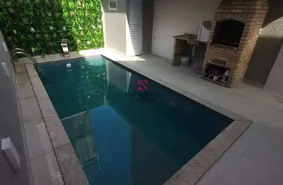 Casa geminada com piscina, 2 dormitórios churrasqueira e 3 vagas no bairro mirim