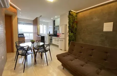 Apartamento decorado frente mar com sacada gourmet no maracanã – praia grande/sp