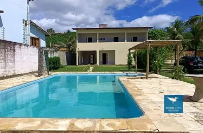 Casa duplex na praia pertinho do beach park porto das dunas, amplo terreno 1820m2, piscina ampla, deck com churrasqueira, chuveirão, 04 suítes, 500m2 de construção na praia do japão a 200 metros do ma